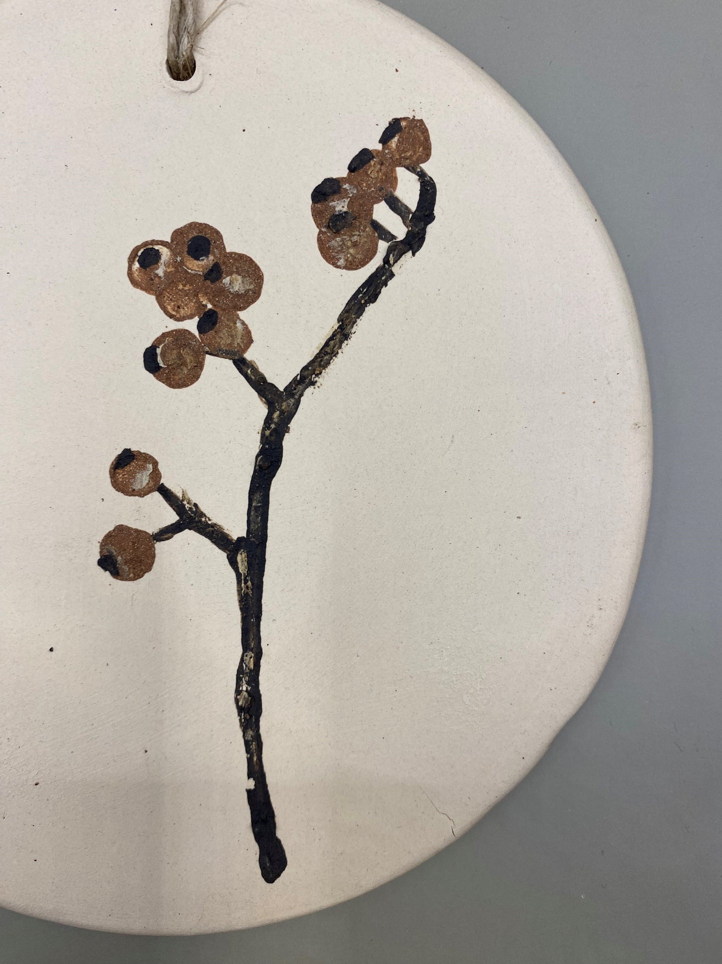 תמונה מחימר לתליה על הקיר