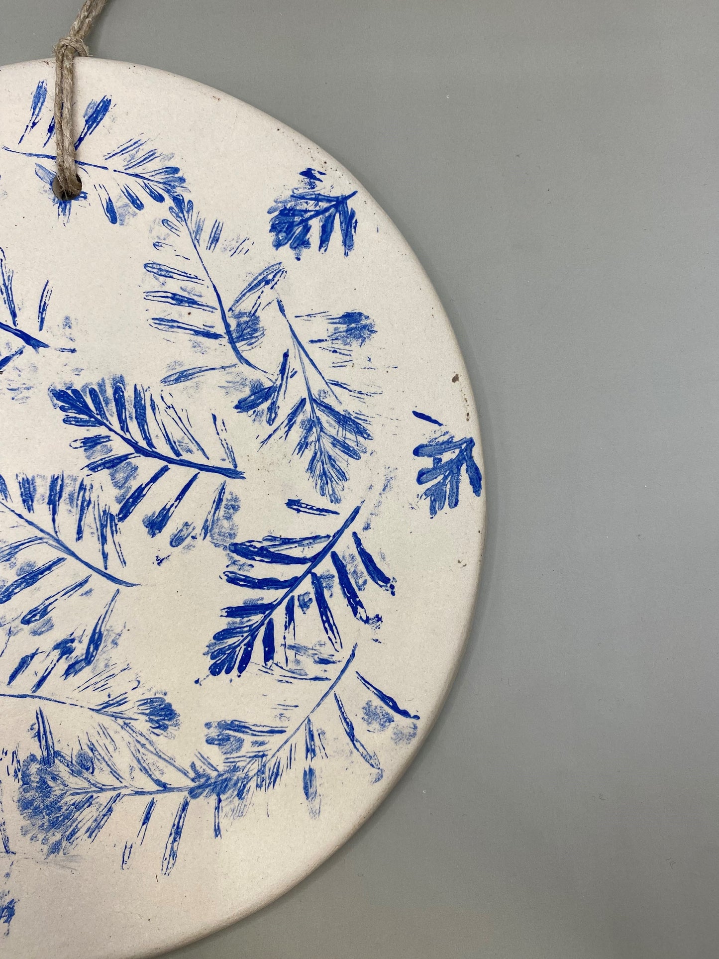 תמונה מחימר לתליה על הקיר