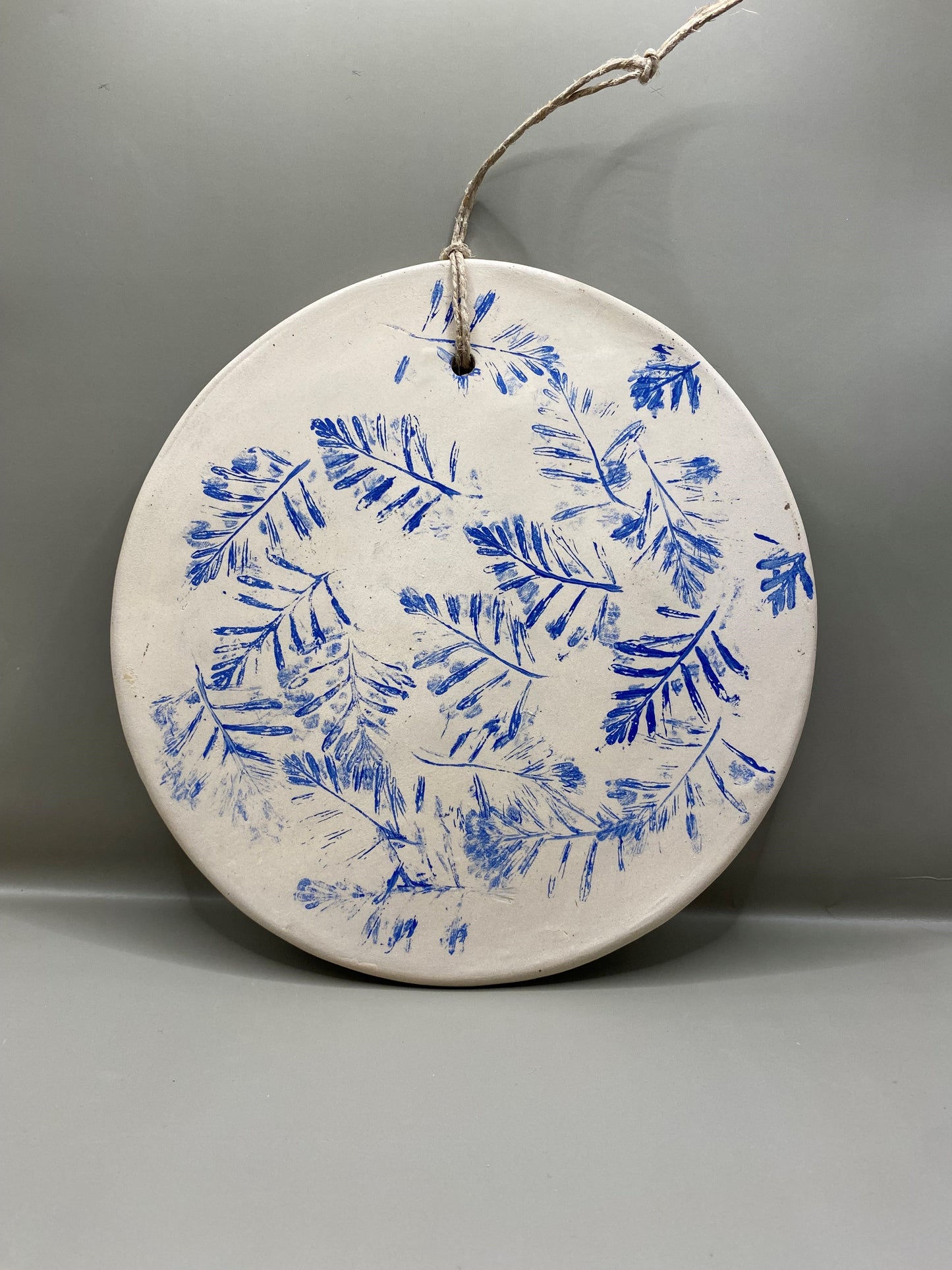 תמונה מחימר לתליה על הקיר