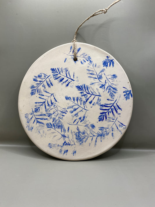 תמונה מחימר לתליה על הקיר